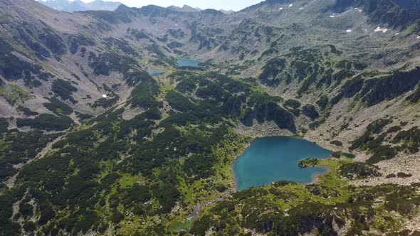 Aerial View of a Lake in the Pirin Mountains with Blue Clear Water