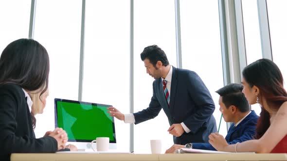 Business People in the Conference Room with Green Screen