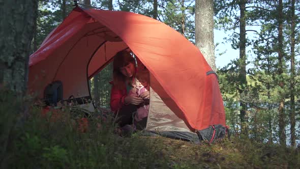 Young American Woman Having Time with Little Girl in Camping on Autumn Day