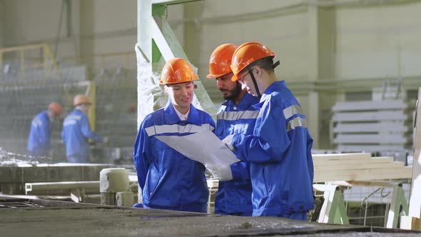 International guests visiting ferroconcrete factory