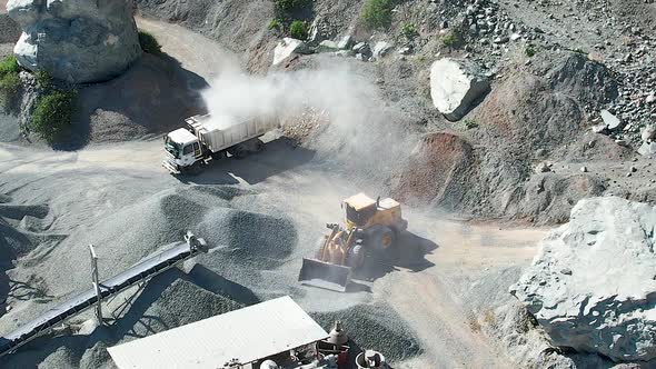 Aerial view of Extracting and transportation of rocks in a shale quarry.