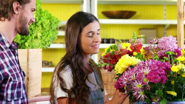 Couple selecting a flower bouquet