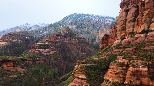 Winter Morning in Canyon Near Sedona Arizona Snow on Rocks 4K Drone Footage