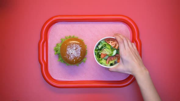 Hands Taking Hamburger and Salad From Plastic Tray, Student Lunch in Canteen