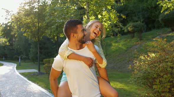 Guy and a Girl Having Fun in the Park