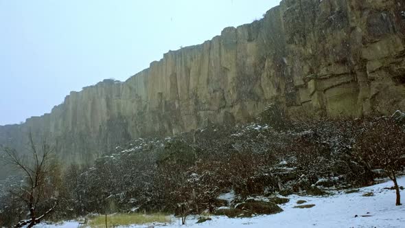 Giant Rocks And Snowfall In The Valley