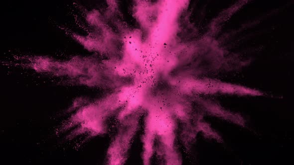 Super Slowmotion Shot of Pink Powder Explosion Isolated on Black Background