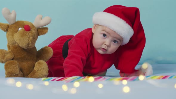 Merry Xmas Happy New Year Infants Childhood Holidays Concept Closeup Smiling Funny Newborn Baby in