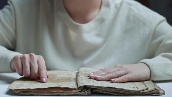 Woman Reading Ancient Book  Bible