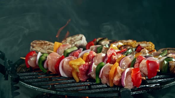 Super Slow Motion Shot of Fresh Skewer Falling on Grill at 1000 Fps