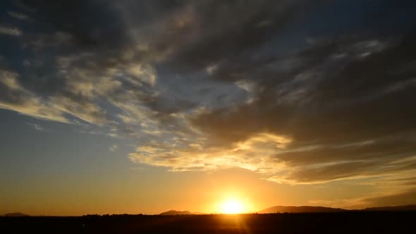 Time Lapse Of Sunset And Speed Clouds