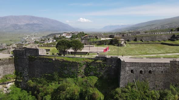 Albanian Flag on Gjirokastra Castle Albania drone view