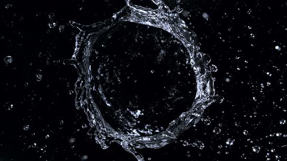 Super Slow Motion Shot of Rotating Water Ring Moving Towards Camera at 1000Fps