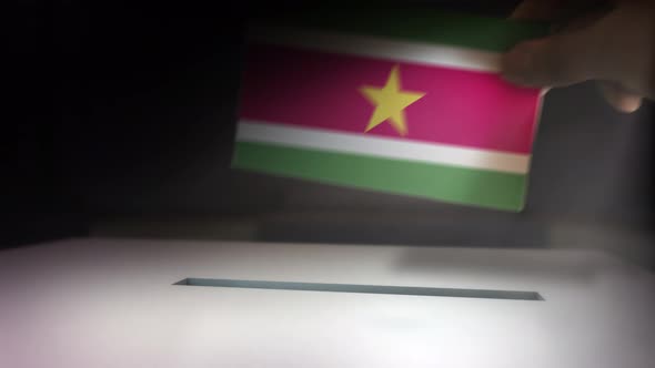 Compositing Hand Voting To Flag OF Suriname