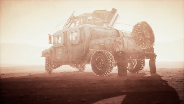 Military Patrol Car on Sunset in Desert Storm