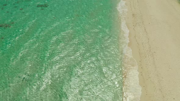 Ocean with Waves and Sandy Beach