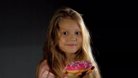 Long Loose Haired Blonde Junior Schoolgirl Bites Donut