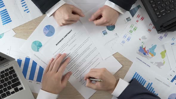 Company Partner Signing Business Contract and Shaking Hands With Director