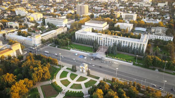 Aerial drone view of Chisinau downtown at sunset. View of Goverment building, Triumph Arch and centr
