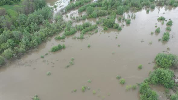 Forest and agricultural fields under flood 4K drone video