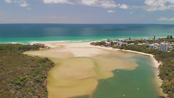 Aerial drone view of beach at Currimundi Lake, Caloundra, Sunshine Coast, Queensland, Australia