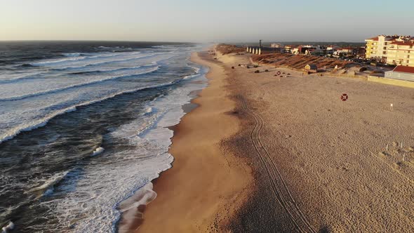 Flight on the Ocean Sandy Shore in the Early Morning Portugal Furadouro