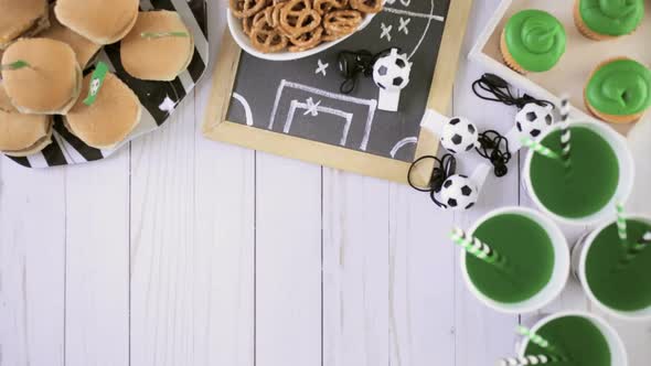 Table with snacks for football party.