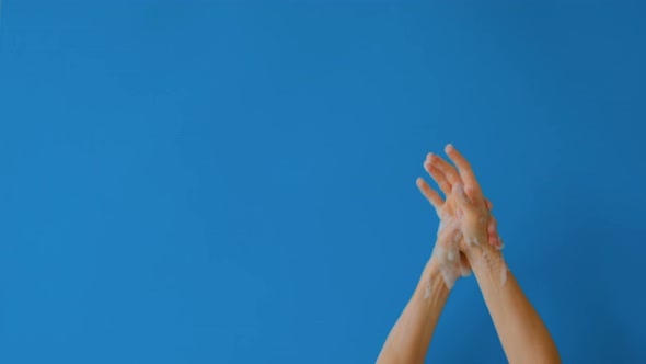 Wash Hands with Soap on Blue Isolated Background