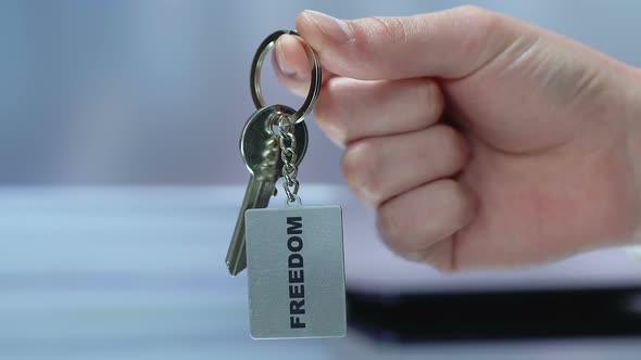 Freedom Word on Keychain, Woman Taking Key, Female Rights Protection, Choice