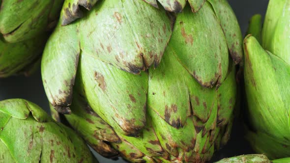 Whole Fresh Artichokes on Plate