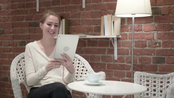 Portrait of Young Woman Doing Video Chat on Tablet