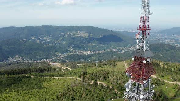 Aerial view of gsm tower transmitter on Skrzyczne Hill and the Silesian Beskid in the background. Sz