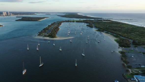 Flying over mored yachts , Gold Coast Broadwater, sunrise, calm