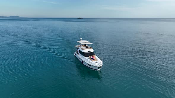 A couple rides a yacht aerial view 4 K Turkey Alanya