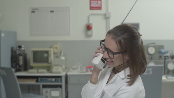 Scientist in the lab talking on the phone