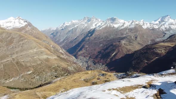 View from the mountains to Zermatt, deep in the valley