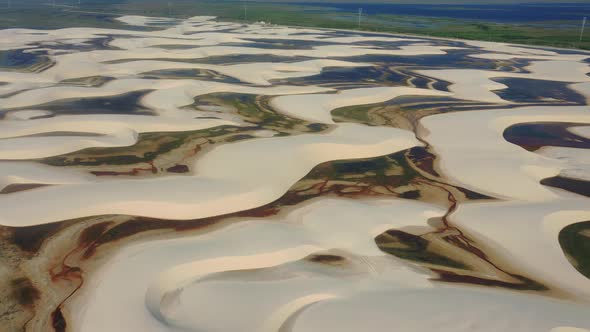 Sand dunes mountains and rain water lagoons at northeast brazilian paradise.