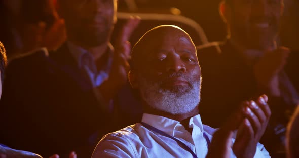 African American businessman applauding in business seminar at auditorium 4k