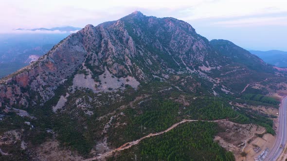 Alpine Valley with Rocky Mountains and Country Road