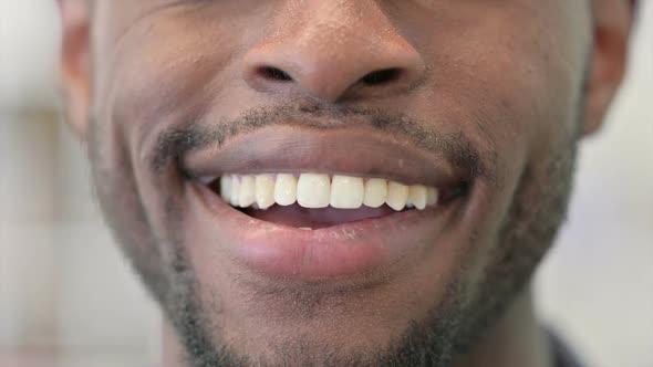 Close Up of Mouth of Smiling Young African Man