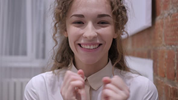 Portrait of Amazed Young Female, Happy by Surprise