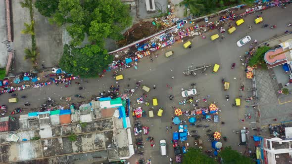 Top down approaching view of busy intersection in Bangalore India