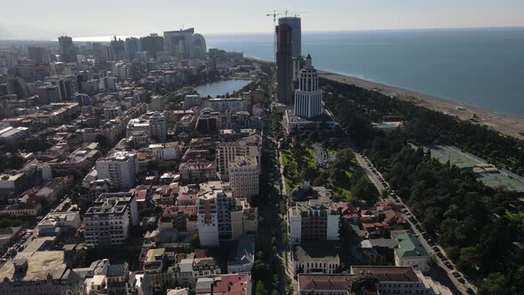 Aerial Footage of Batumi with the View of Black Sea Construction of Skyscraper