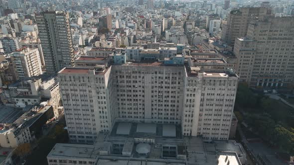 Aerial pan right of Clinic Hospital and famous public Faculty of Medicine near Houssay Square, Bueno