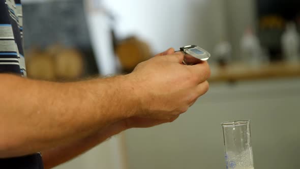 Male worker using magnifying glass 4k