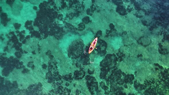 A Guy Sails in a Kayak Aerial View 4 K