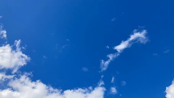 Time Lapse Clear Very Beautiful Soft Blue Sky Light White Clouds Flying Across the Bright Blue Sky