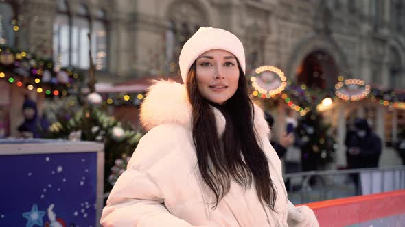 Christmas Ice Rink with a Brunette Girl