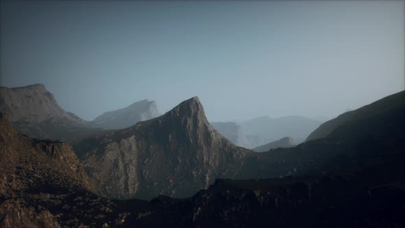 Landscape of the Dolomites Mountain Range Covered in the Fog