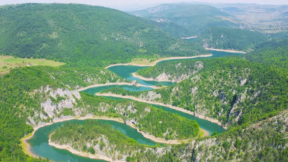 Winding Blue River Meandri Cehotine on the Mountains with Green Forest in Pljevlja Montenegro